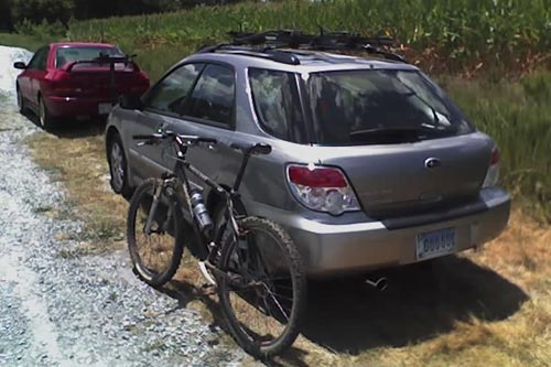 A bike and a Subaru